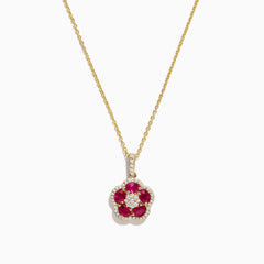 The Ruby Royale 14K Yellow Gold Ruby and Diamond Flower Pendant (1.43 TCW) features round rubies and diamond accents in a flower design, showcased on a white background.
