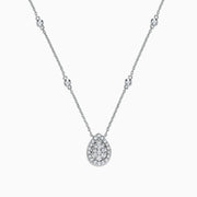 The Pave Classica 14K White Gold Diamond Necklace, 0.41 TCW, features a sparkling teardrop pendant adorned with diamonds and evenly spaced round diamond accents along the chain for an elegant look.
