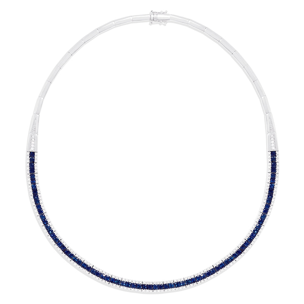 A close-up of the Royale Bleu 14K White Gold Sapphire and Diamond Necklace (11.21 TCW) showcases its elegant, symmetrical design with square sapphires bordered by sparkling diamonds.