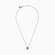 The Signature 14K Rose Gold Diamond and Tsavorite Panther Head Necklace, 0.33 TCW, features a panther’s head adorned with sparkling diamonds, vivid tsavorite eyes, and bold black accents.