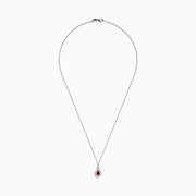 The Ruby Royale 14K Two Tone Gold Pear Shaped Ruby Pendant (0.68 TCW) features a stunning ruby, accented by small clear stones, showcased on a white background.
