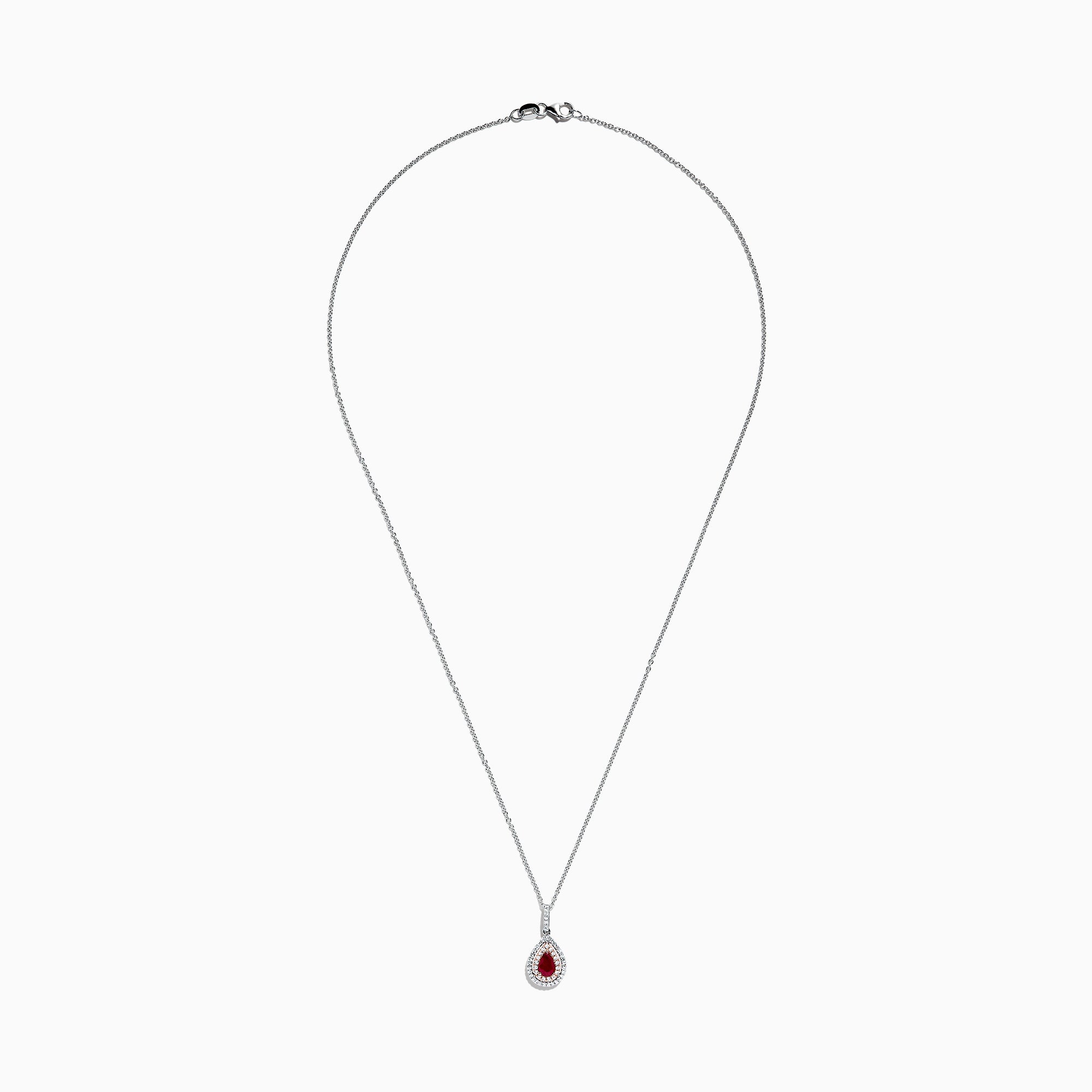 The Ruby Royale 14K Two Tone Gold Pear Shaped Ruby Pendant (0.68 TCW) features a stunning ruby, accented by small clear stones, showcased on a white background.