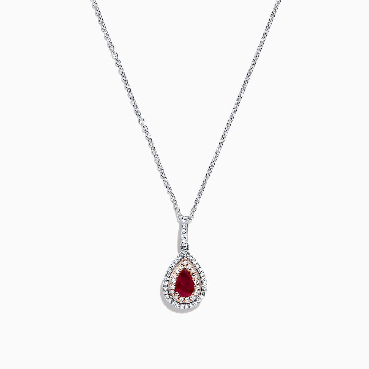 The Ruby Royale 14K Two Tone Gold Pear Shaped Ruby Pendant (0.68 TCW) features a stunning ruby, accented by small clear stones, showcased on a white background.