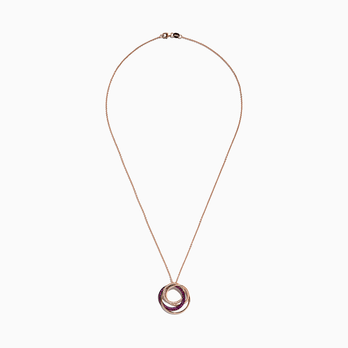 The Ruby Royale 14K Rose Gold Pendant showcases three interlocking ruby and diamond circles (0.66 TCW) on a delicate chain, set against a white background.