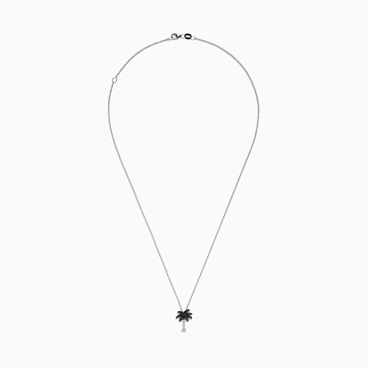 A Novelty 14K Gold Palm Tree Pendant with 0.27 TCW black and white diamonds, displayed on a fine chain against a white background.