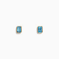 Ocean Bleu 14K Yellow Gold Blue Topaz Stud Earrings, 1.37 TCW by Effy Jewelry are small, rectangular blue topaz studs set in yellow gold, shown against a plain white background.