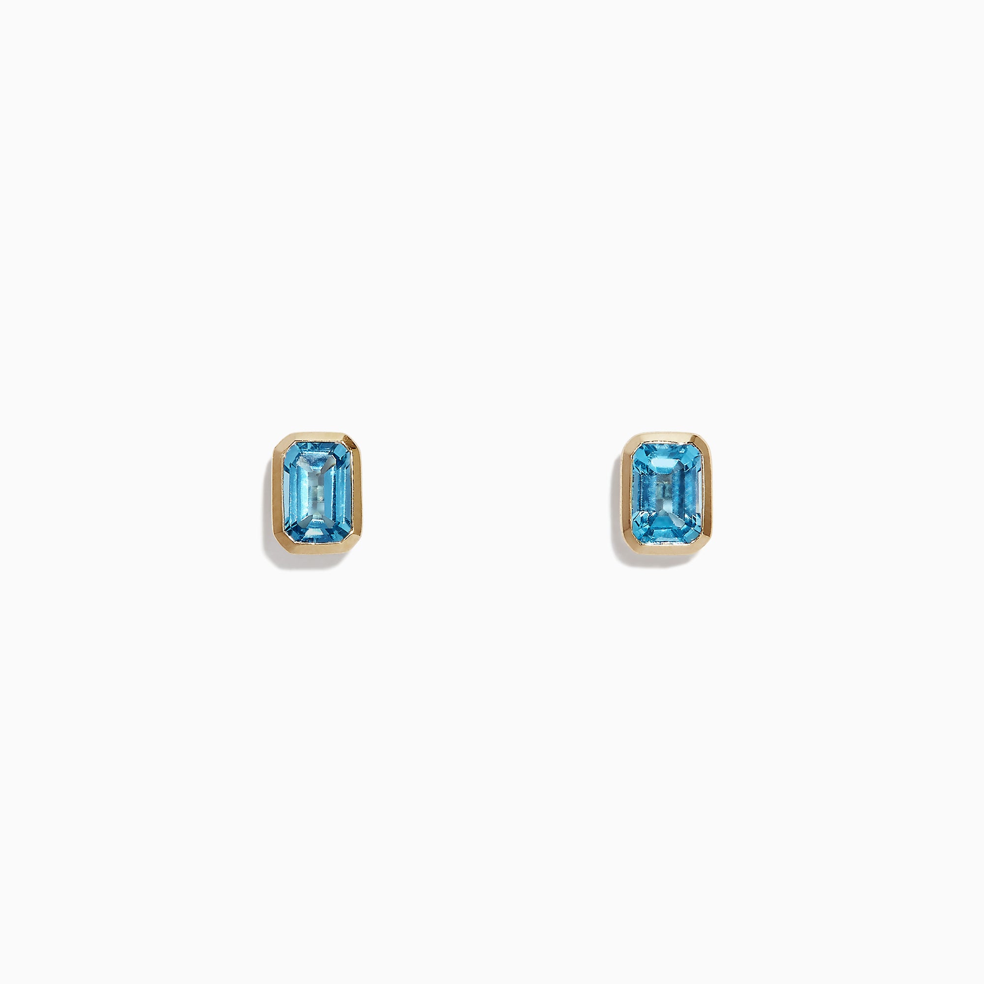 Ocean Bleu 14K Yellow Gold Blue Topaz Stud Earrings, 1.37 TCW by Effy Jewelry are small, rectangular blue topaz studs set in yellow gold, shown against a plain white background.