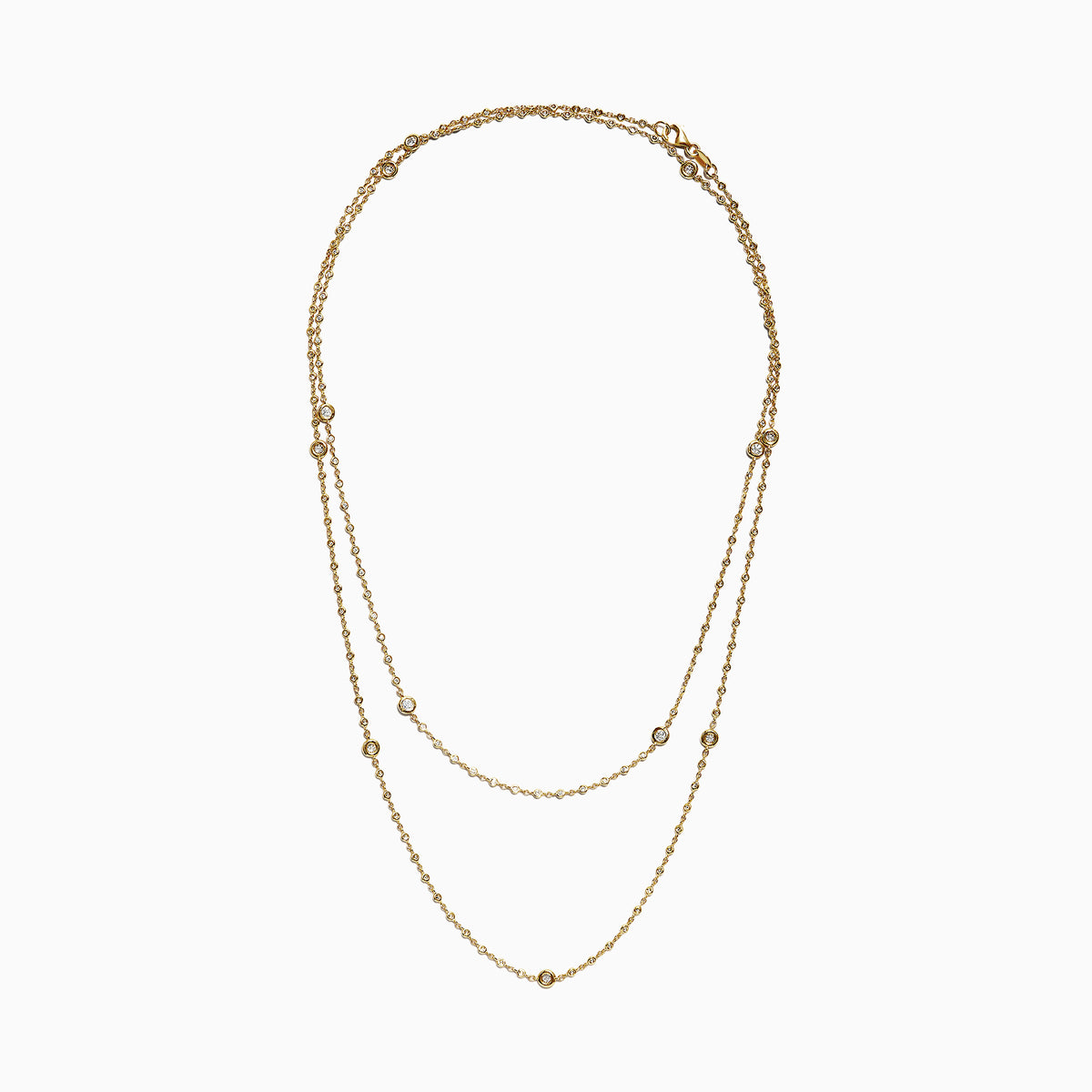 The DOro 14K Yellow Gold Diamond Station Necklace, 1.35 TCW, features small round diamonds spaced evenly along double layers for an elegant, minimalist style.