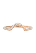 The Pave Classica 14K Rose Gold Curved Diamond Stacking Band features a graceful chevron shape, highlighted by small sparkling white diamonds set along the top curve.