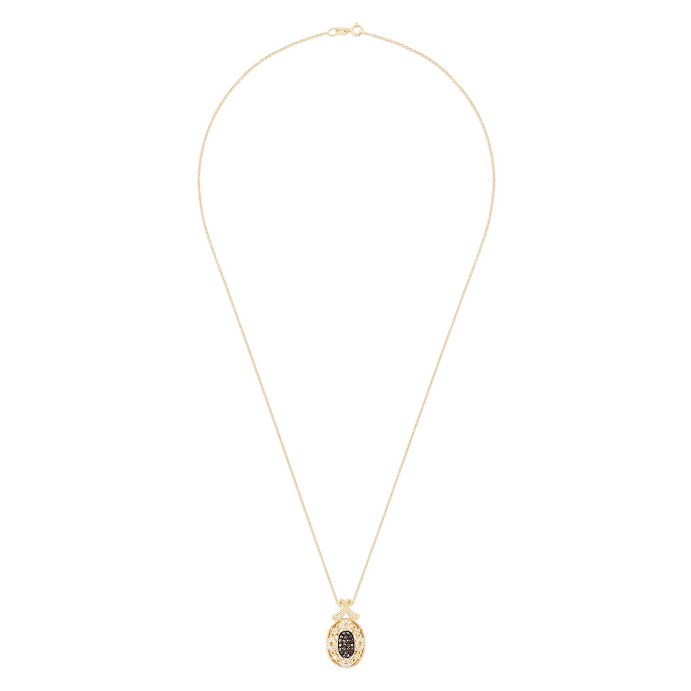 14K yellow gold necklace with an ornate pendant featuring espresso and white diamonds (0.29 TCW) in an intricate design, hanging from a delicate gold chain.