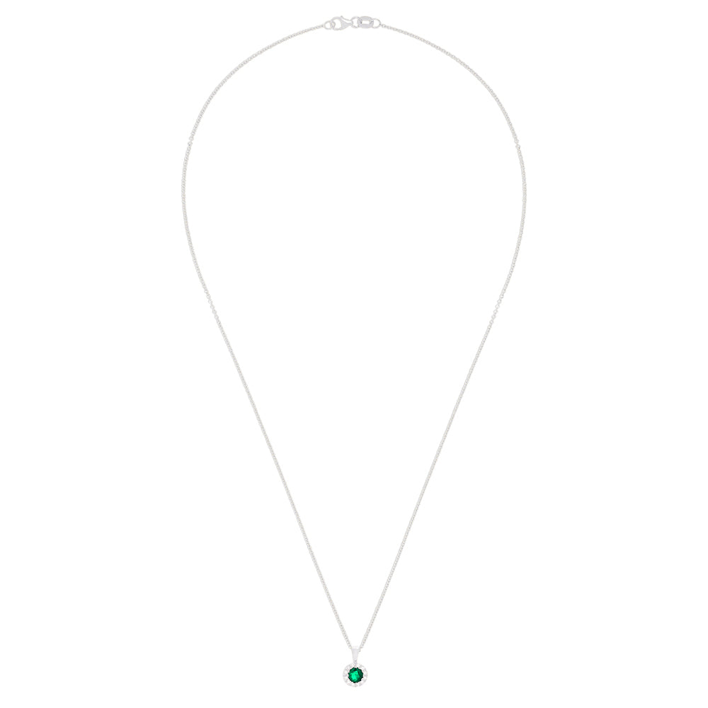 The Brasilica 14K White Gold Emerald and Diamond Pendant features a round emerald with a halo of diamonds (0.41 TCW), suspended from a delicate white gold chain.