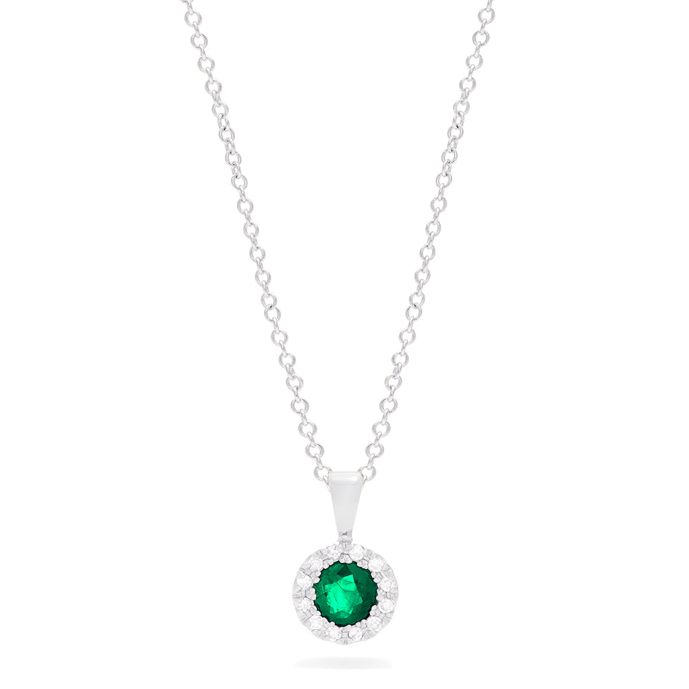 The Brasilica 14K White Gold Emerald and Diamond Pendant features a round emerald with a halo of diamonds (0.41 TCW), suspended from a delicate white gold chain.