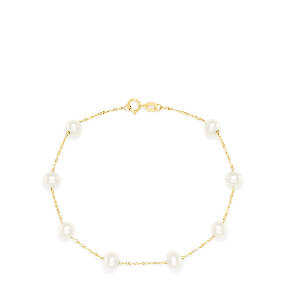 The 14K Yellow Gold Cultured Fresh Water Pearl Station Bracelet features evenly spaced pearls on a delicate gold chain with a small round clasp, shown against a white background.
