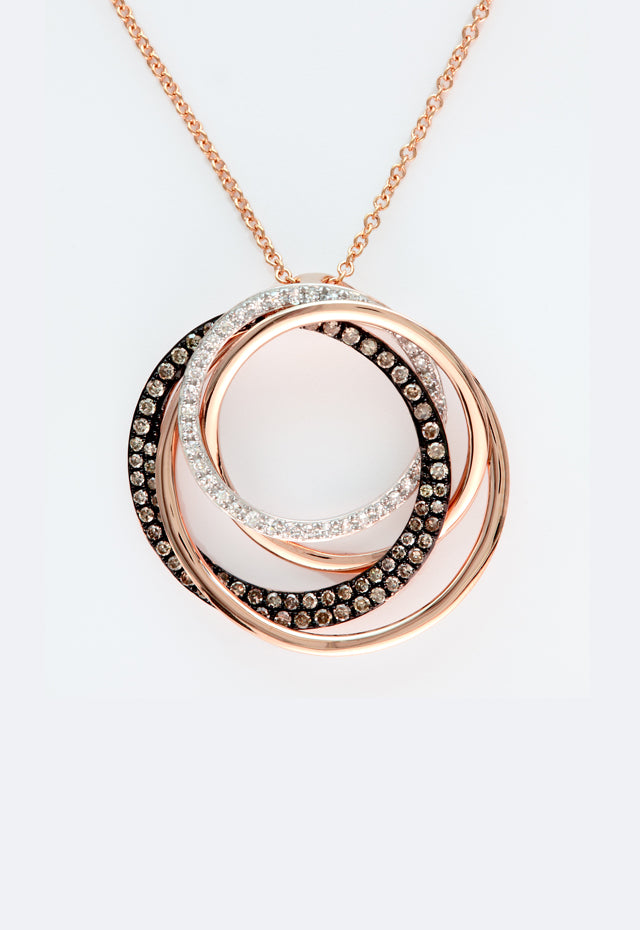 A 14K rose gold pendant featuring three interlocking circles—one with white diamonds, one with espresso diamonds, and one plain—on a delicate chain, inspired by the elegance of the 0.43 TCW Espresso and White Diamond Pendant.