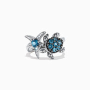 Seaside S. Silver Topaz & Diamond Turtle and Starfish Ring, 1.06 TCW, features blue gemstones and sparkling clear stones on turtle and starfish motifs, shown on a white background.