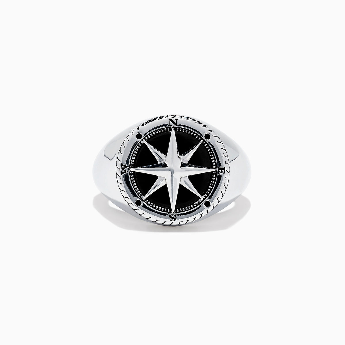 The Mens Sterling Silver Onyx Compass Ring, 2.61 TCW, features a raised compass rose with black enamel and engraved cardinal directions on a plain white background, creating a bold statement piece.