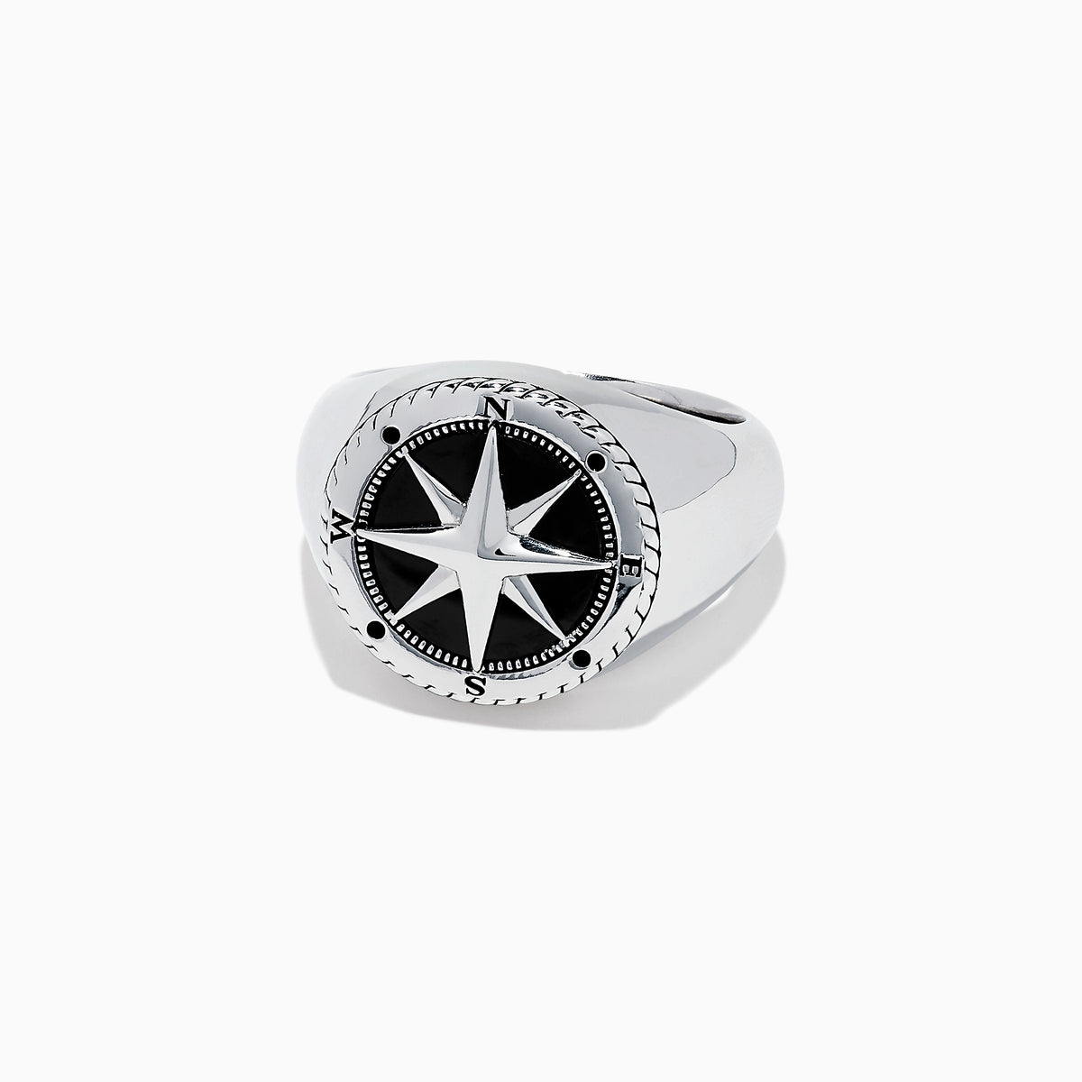 The Mens Sterling Silver Onyx Compass Ring, 2.61 TCW, features a raised compass rose with black enamel and engraved cardinal directions on a plain white background, creating a bold statement piece.