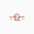 The Blush 14K Rose Gold Morganite and Diamond Ring, 2.64 TCW, features an oval morganite center with two white diamonds on a detailed band, shown on a white background.