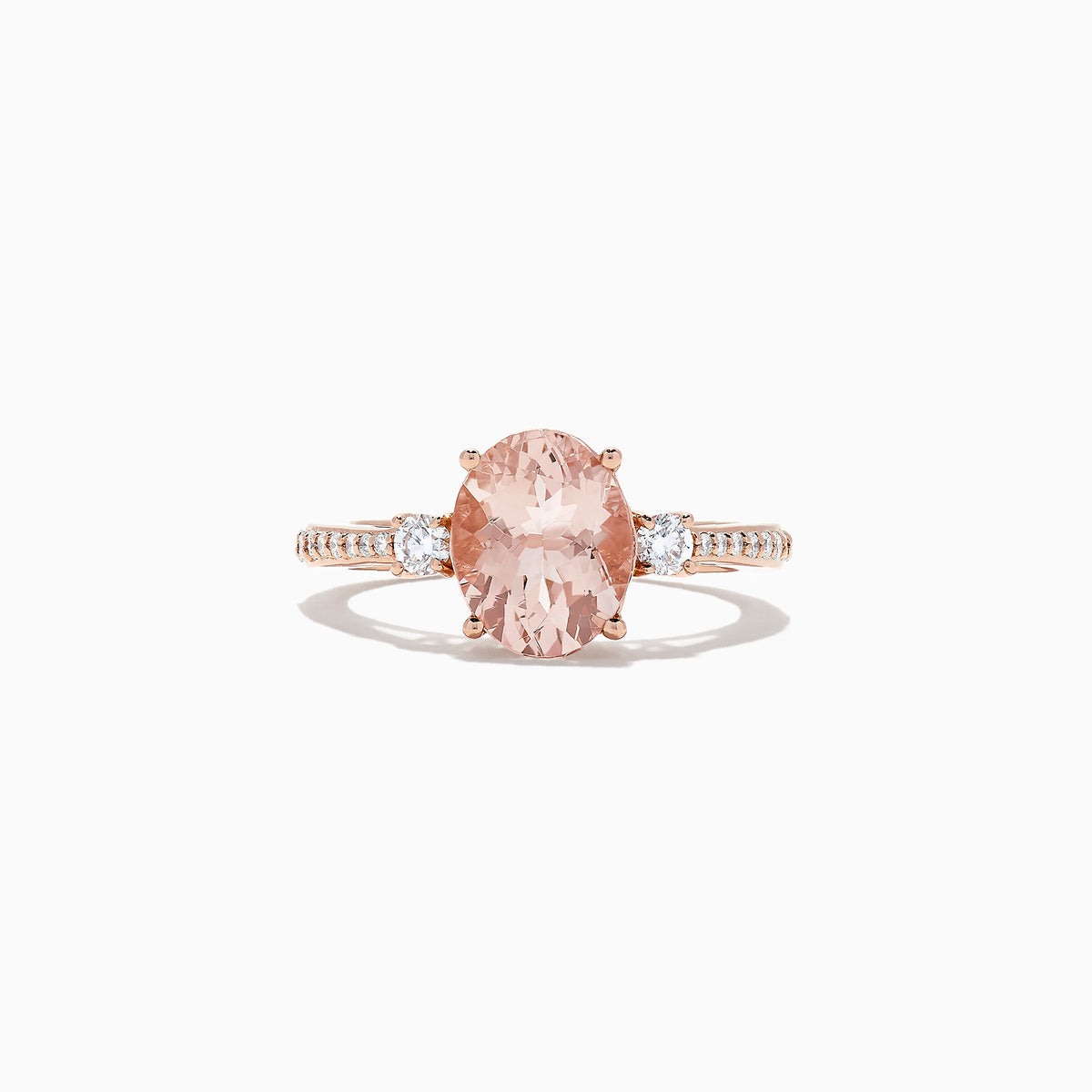 The Blush 14K Rose Gold Morganite and Diamond Ring, 2.64 TCW, features an oval morganite center with two white diamonds on a detailed band, shown on a white background.