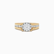 The Bouquet 14K Yellow Gold Channel Set Diamond Engagement & Wedding Ring Set, 1.48 TCW, features a brilliant diamond center and two matching diamond bands—an elegant choice for your special day.