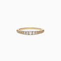 The Pave Classica 14K Yellow Gold Diamond Band Ring, 0.31 TCW, features a sparkling row of diamonds set in yellow gold, elegantly displayed on a plain white background.