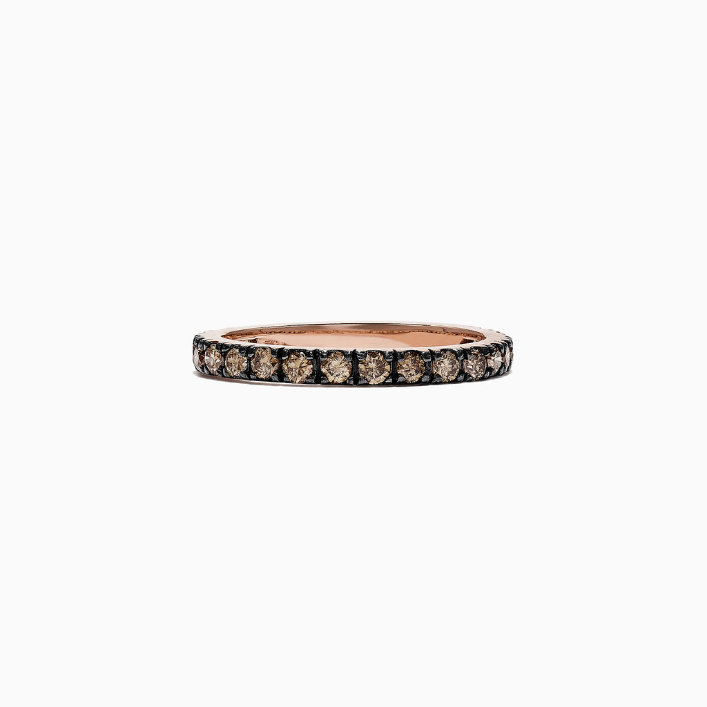 The 14K Rose Gold Brown Diamond Stacking Ring, 0.65 TCW, showcases a full circle of round brown diamonds in a channel setting, perfect for stacking and shown against a white backdrop.