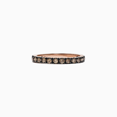 The 14K Rose Gold Brown Diamond Stacking Ring, 0.65 TCW, showcases a full circle of round brown diamonds in a channel setting, perfect for stacking and shown against a white backdrop.