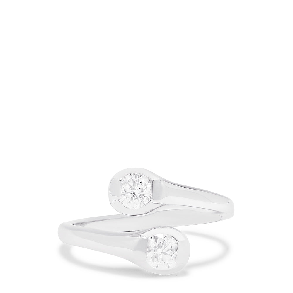 A 14K White Gold Two-of-Us Diamond Ring, 0.59 TCW, elegantly showcases two round bezel-set diamonds on a sleek band—an exquisite Effy design displayed on a white background.