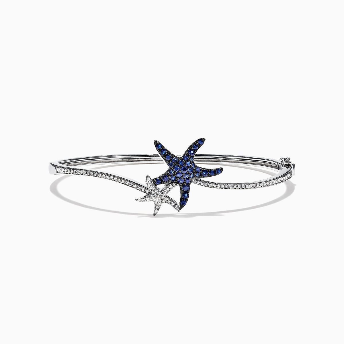 The Seaside 14K Gold Blue Sapphire & Diamond Starfish Bracelet, 1.06 TCW features two starfish—one adorned with blue sapphires, the other with diamond accents—plus sparkling clear stones along part of the bangle.