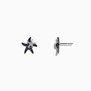 The Seaside 14K White Gold Sapphire & Diamond Starfish Stud Earrings (0.71 TCW) feature blue sapphires and diamonds in a starfish design, shown against a plain white background.