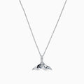 The Seaside 14K White Gold Diamond Whales Tail Pendant, 0.05 TCW, is showcased with a row of sparkling diamonds along the center, set against a plain white background.