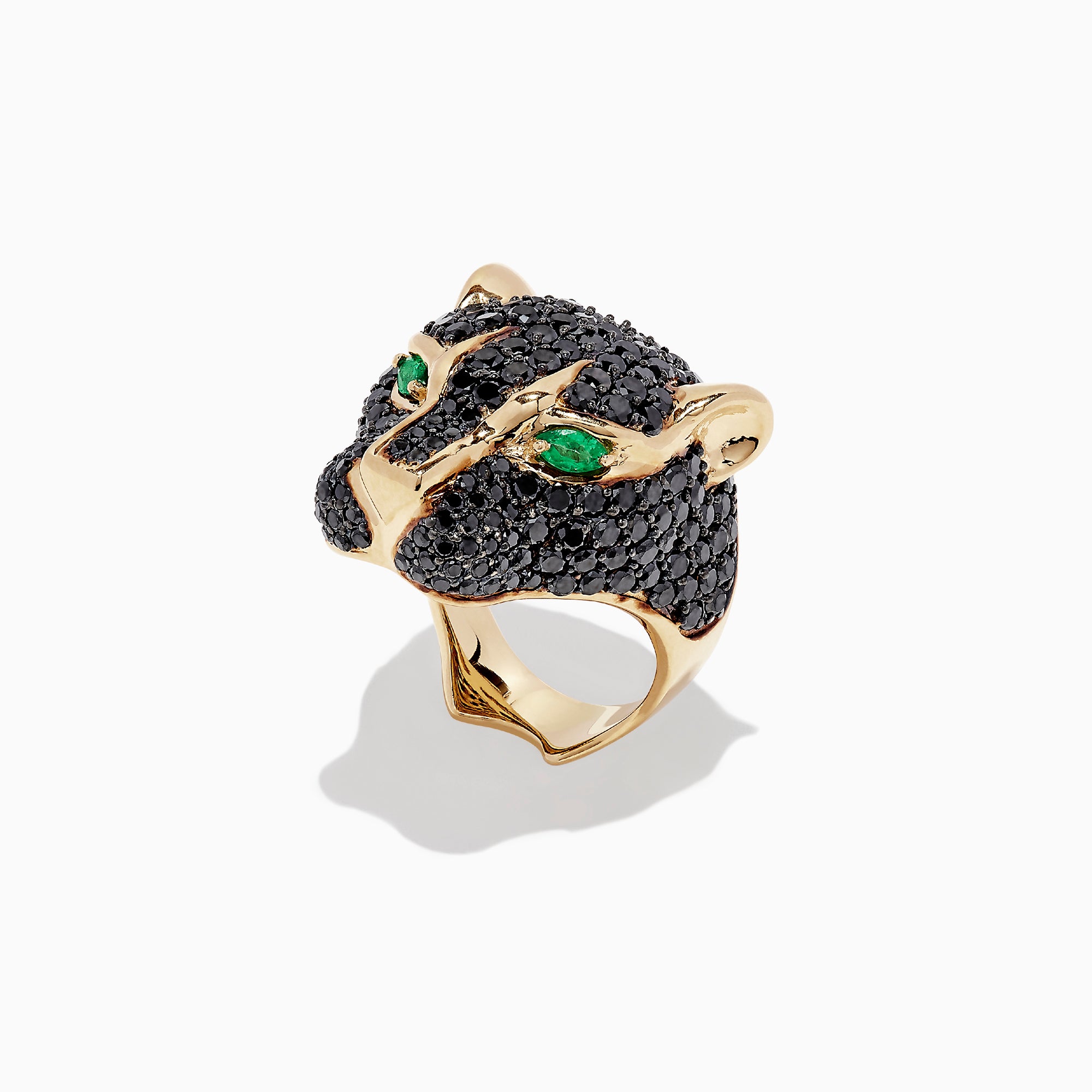 The Collectors Edition 14K Yellow Gold Black Diamond Ring, 3.80 TCW, features a panther head design with black diamonds and vivid green eyes, elegantly showcased against a plain white background.