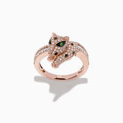 The Signature 14K Rose Gold Diamond and Tsavorite Ring (0.72 TCW) features a panther-shaped head encrusted with diamonds and vivid tsavorite eyes, displayed against a white background.