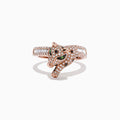 The Signature 14K Rose Gold Diamond and Tsavorite Ring (0.72 TCW) features a panther-shaped head encrusted with diamonds and vivid tsavorite eyes, displayed against a white background.