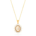 The Aurora 14K Yellow Gold Opal and Diamond Pendant (1.28 TCW) features an oval opal and diamond centerpiece, framed by sparkling round white stones in a radiant sunburst design on a yellow gold chain necklace.
