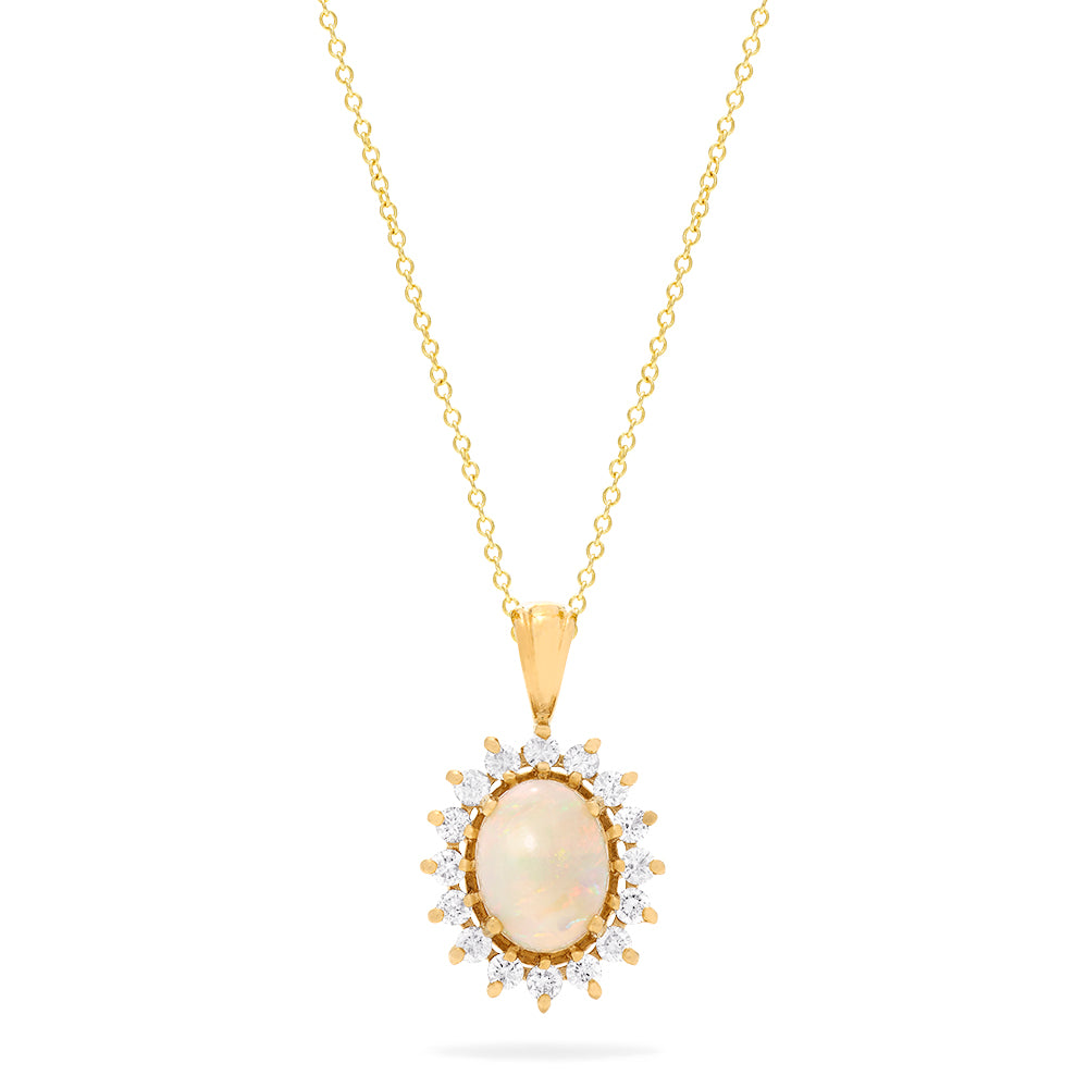 The Aurora 14K Yellow Gold Opal and Diamond Pendant (1.28 TCW) features an oval opal and diamond centerpiece, framed by sparkling round white stones in a radiant sunburst design on a yellow gold chain necklace.