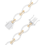 The Duo 14K White and Yellow Gold Diamond Chain Link Tennis Bracelet, 2.01 TCW, features alternating gold and silver oval links with sparkling diamonds, displayed elegantly on a white background.