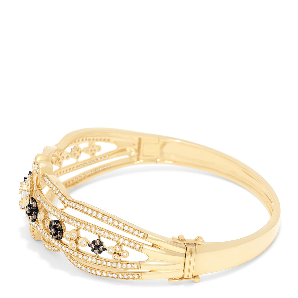 The 14K Yellow Gold Diamond Filigree Bangle, 2.03 TCW, features intricate filigree patterns and sparkling diamond clusters, elegantly detailed along the band.
