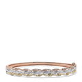 The Trio 14K Tri Color Gold Diamond Bangle, 1.42 TCW, showcases three wavy rows of white and yellow diamonds set in rose, white, and yellow gold for a brilliant, elegant look.