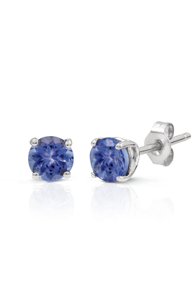 14K White Gold Round Tanzanite Stud Earrings, 0.65 TCW, feature faceted blue gemstones in prong settings and are shown against a white background.