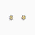 The Canare 18K Two-Tone Gold Oval Yellow Diamond Stud Earrings, 0.51 TCW, feature oval yellow diamonds with a halo of small white stones and are shown against a plain white background.
