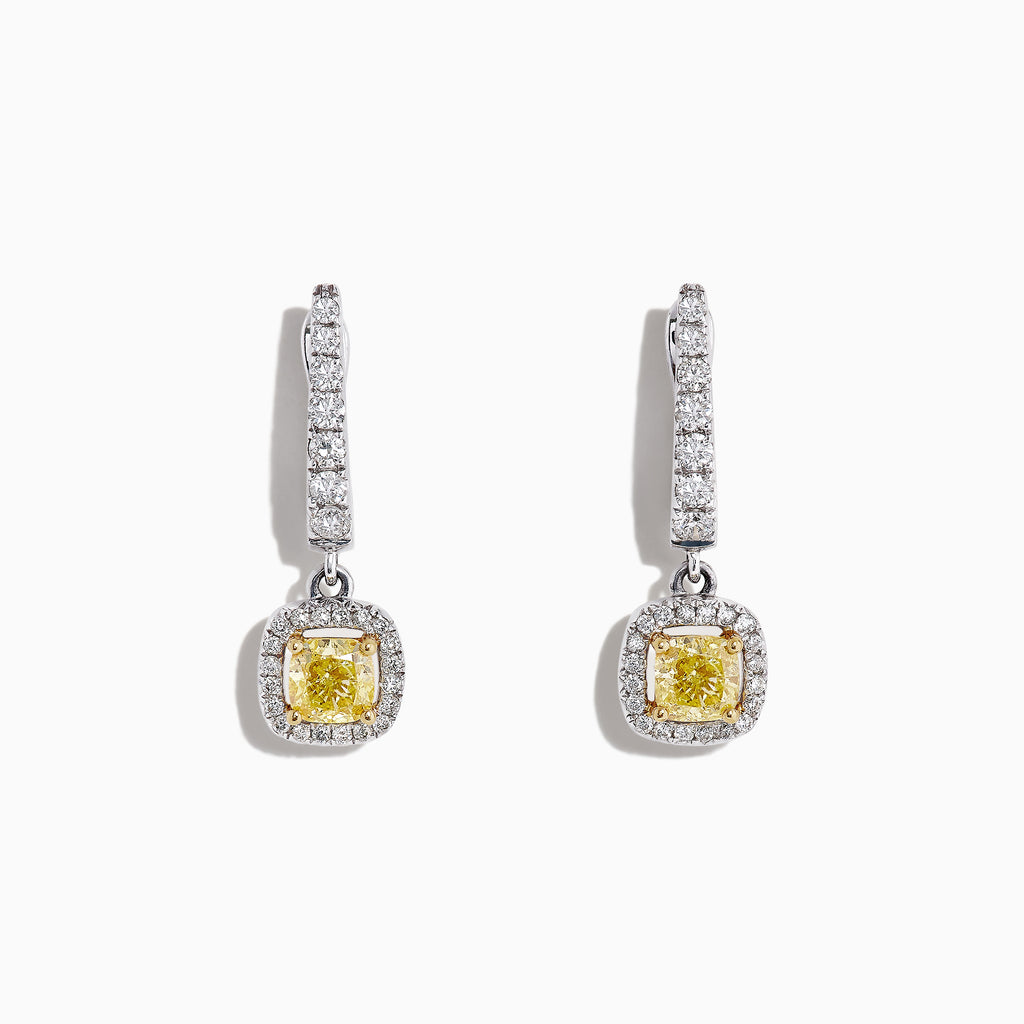 The Canare 18K Two-Tone Cushion Cut Yellow Diamond Drop Earrings (1.06 TCW) feature square yellow diamonds surrounded by clear stones, set in silver with extra clear stones along the drop. Displayed on a white background.
