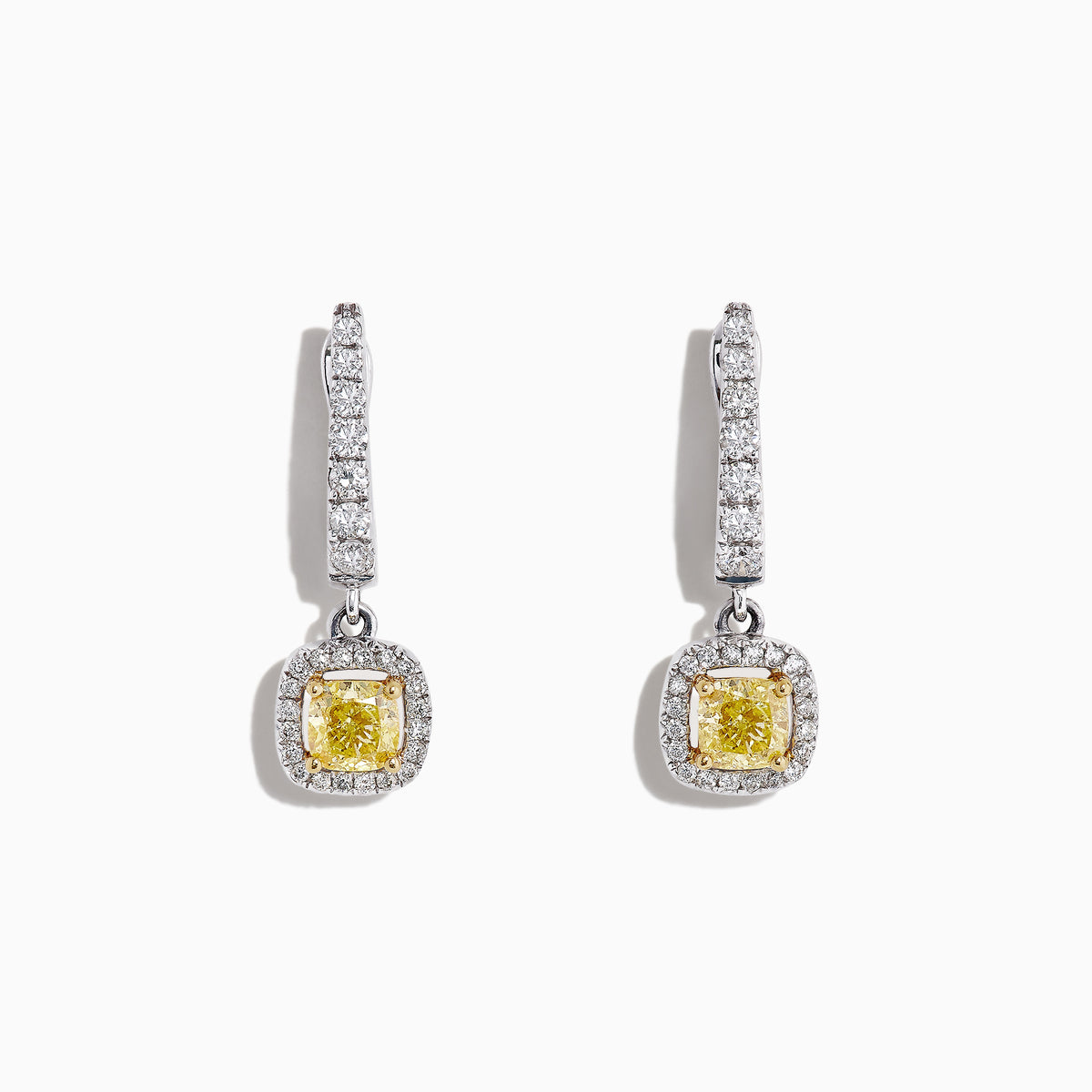 The Canare 18K Two-Tone Cushion Cut Yellow Diamond Drop Earrings (1.06 TCW) feature square yellow diamonds surrounded by clear stones, set in silver with extra clear stones along the drop. Displayed on a white background.