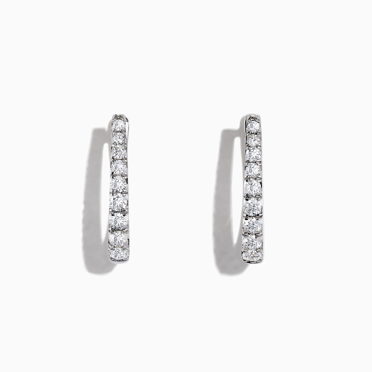 A pair of Pave Classica 14K White Gold 3/4 Diamond Hoop Earrings, 0.49 TCW, displayed upright against a plain white background with soft shadows.