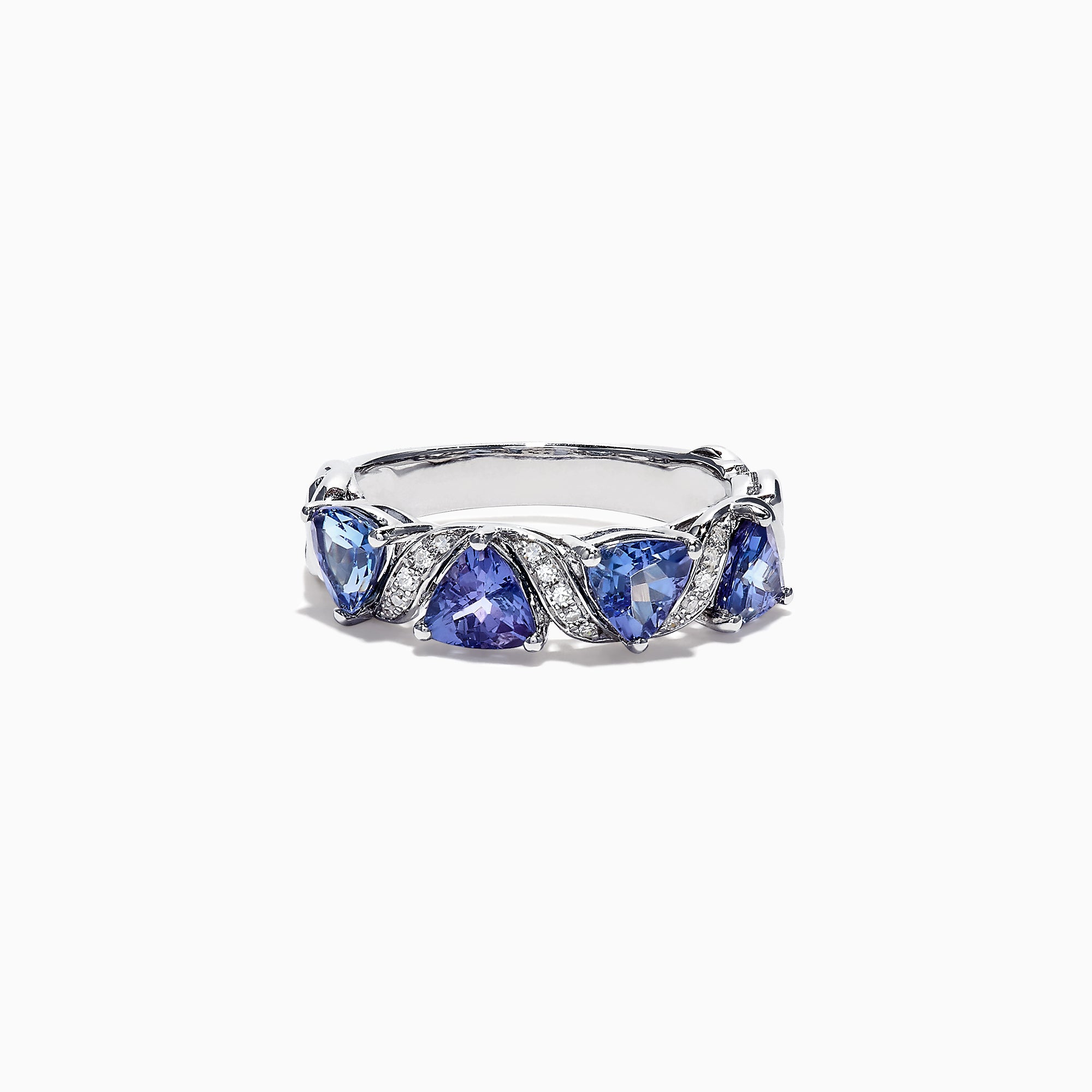 The Nahla Siri 14K White Gold Tanzanite Diamond Ring, 1.58 TCW, features three heart-shaped blue tanzanites set among wavy silver and diamond accents, shown on a white background.