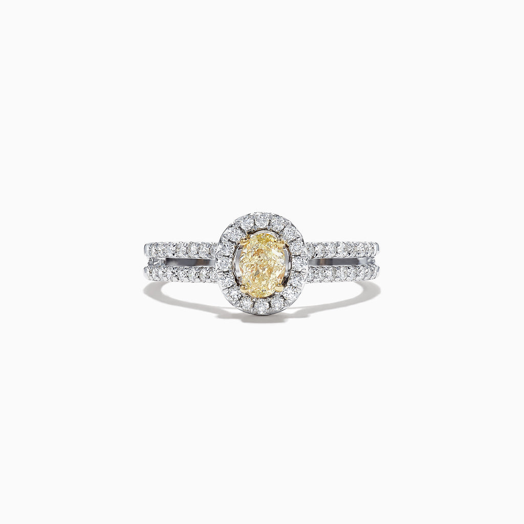 The Canare 18K Two-Tone Gold Yellow and White Diamond Ring, 0.71 TCW, features an oval yellow diamond center, haloed by white diamonds on a split band for a striking two-tone look.
