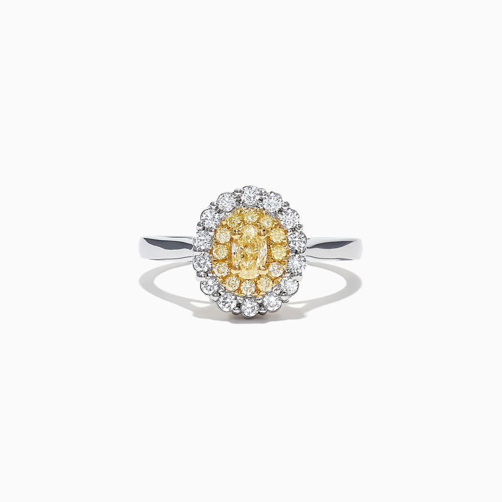 The Canare 18K Two-Tone Gold Oval Double Halo Yellow Diamond Ring, 0.65 TCW, features a central oval yellow diamond cluster and twin white diamond halos, elegantly set against a plain white background.