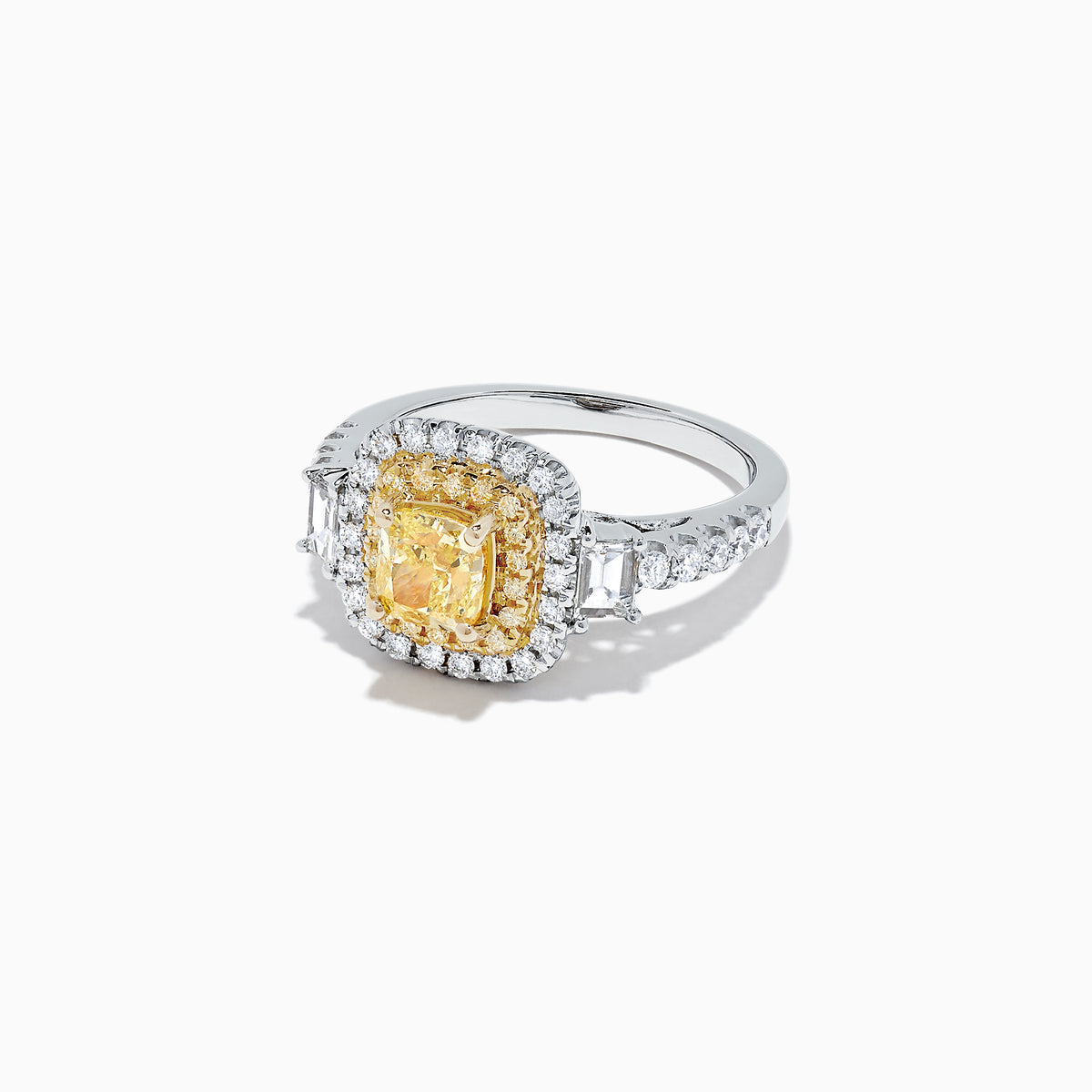The Canare 18K Two-Tone Gold Cushion Cut Yellow Diamond Ring (1.98 TCW) features a double halo of white diamonds and a diamond-accented band, shown against a white background.