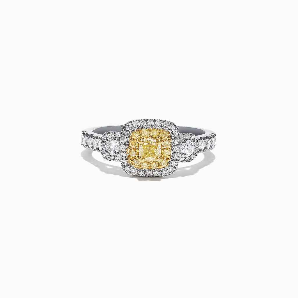 The Canare 18K Two-Tone Gold Cushion Double Halo Yellow Diamond Ring, 0.96 TCW, features a cushion-cut yellow diamond with a double white diamond halo and diamonds set along the band.