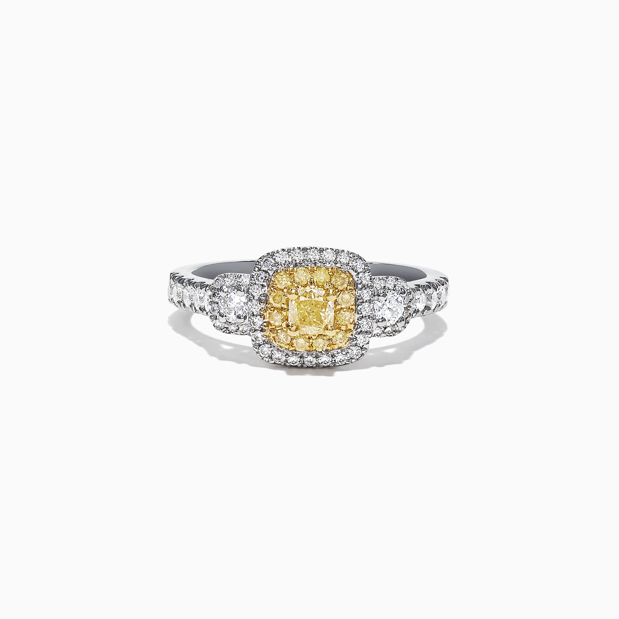 The Canare 18K Two-Tone Gold Cushion Double Halo Yellow Diamond Ring, 0.96 TCW, features a cushion-cut yellow diamond with a double white diamond halo and diamonds set along the band.